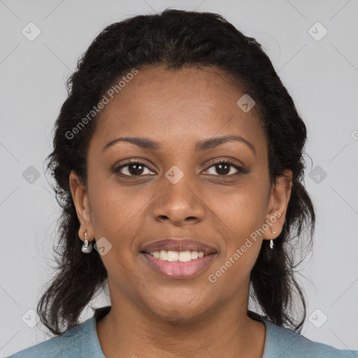 Joyful black young-adult female with medium  brown hair and brown eyes