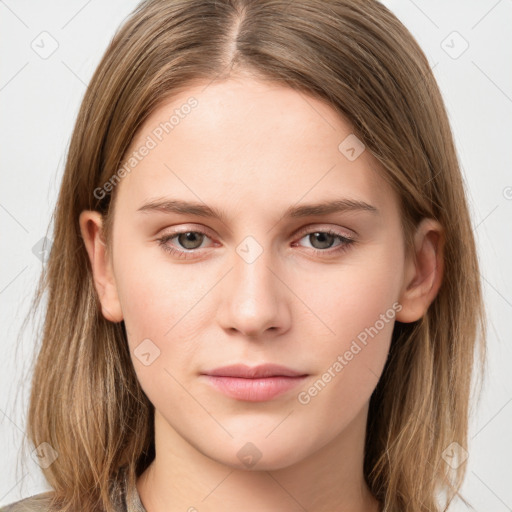 Neutral white young-adult female with long  brown hair and grey eyes