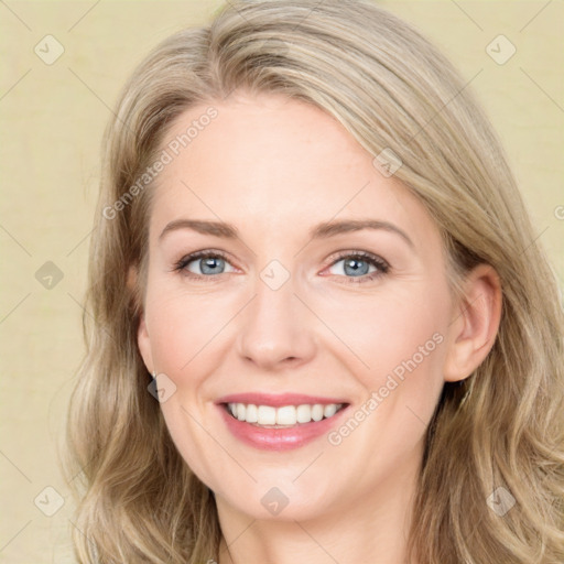 Joyful white young-adult female with long  brown hair and green eyes