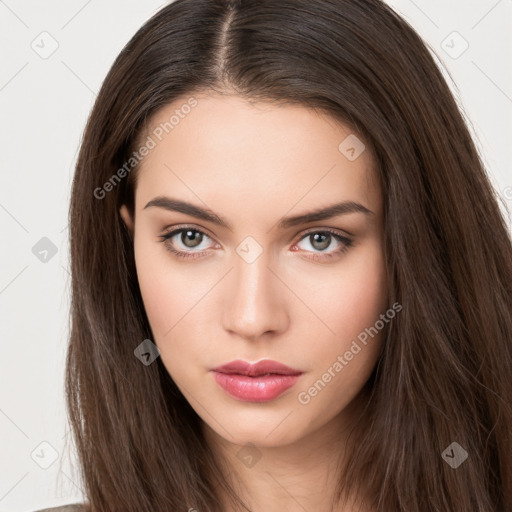 Neutral white young-adult female with long  brown hair and brown eyes