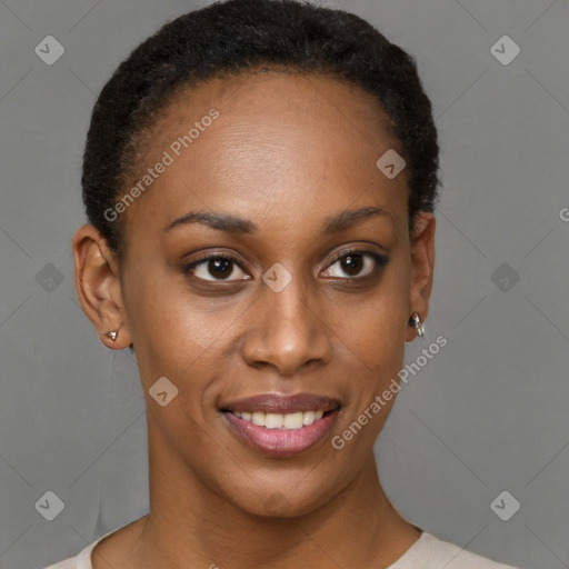 Joyful black young-adult female with short  brown hair and brown eyes