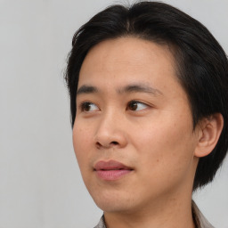 Neutral asian young-adult male with short  brown hair and brown eyes