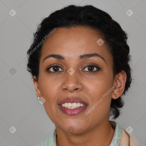 Joyful black young-adult female with medium  brown hair and brown eyes