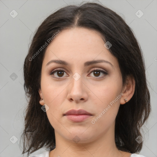 Neutral white young-adult female with medium  brown hair and brown eyes