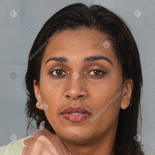 Joyful latino young-adult female with medium  brown hair and brown eyes