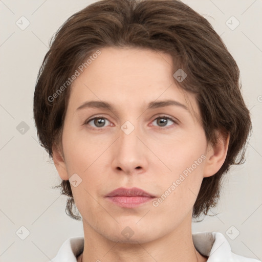 Neutral white young-adult female with medium  brown hair and brown eyes