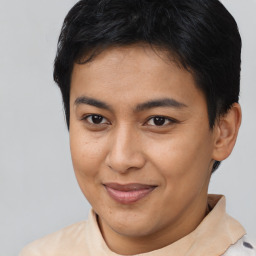 Joyful asian young-adult female with short  brown hair and brown eyes