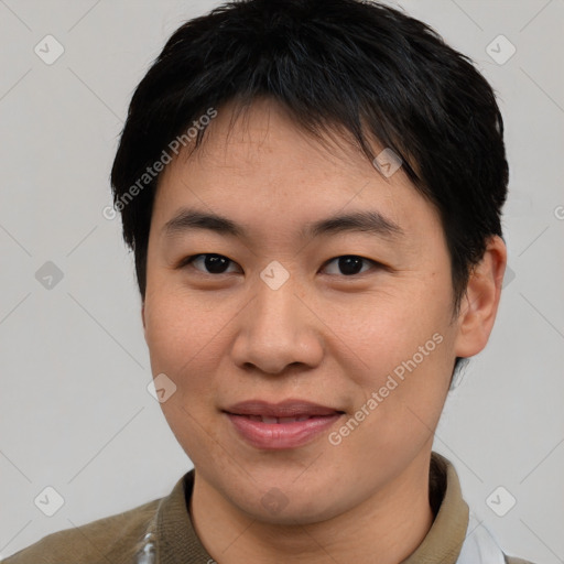 Joyful asian young-adult female with short  brown hair and brown eyes