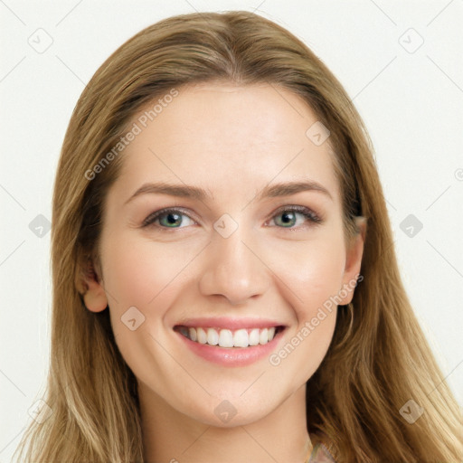 Joyful white young-adult female with long  brown hair and blue eyes