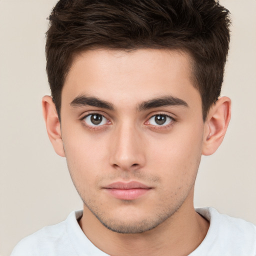 Neutral white young-adult male with short  brown hair and brown eyes