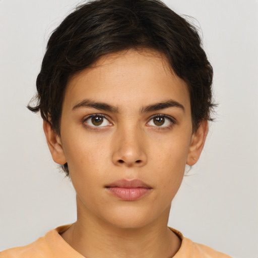 Neutral white young-adult female with short  brown hair and brown eyes