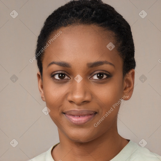 Joyful black young-adult female with short  black hair and brown eyes