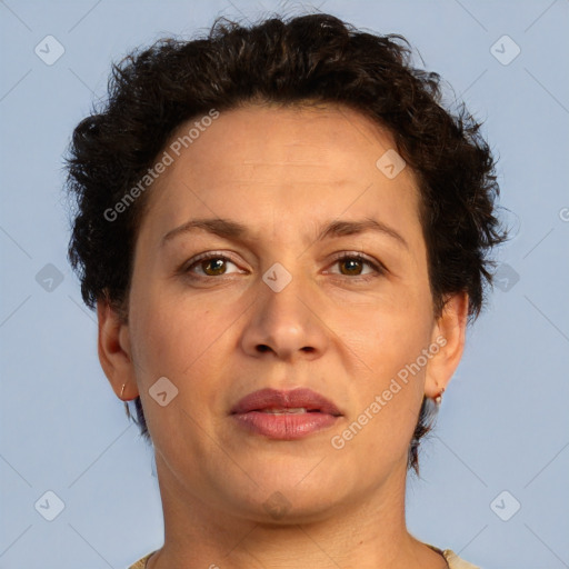 Joyful white adult female with short  brown hair and brown eyes