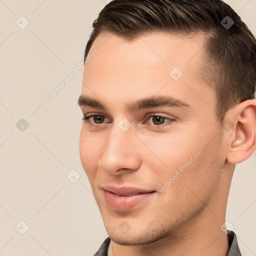 Joyful white young-adult male with short  brown hair and brown eyes