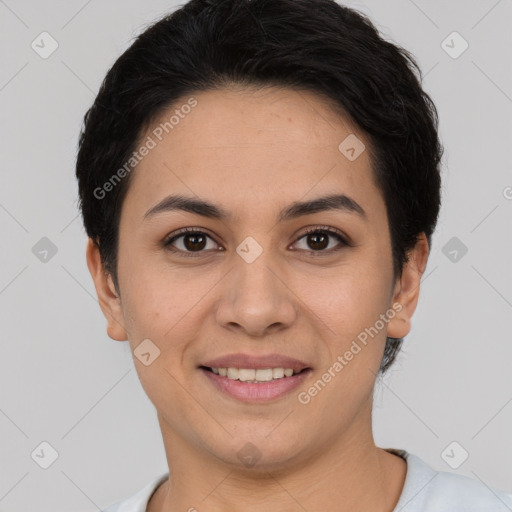 Joyful latino young-adult female with short  brown hair and brown eyes