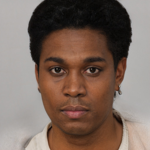 Neutral black young-adult male with short  black hair and brown eyes