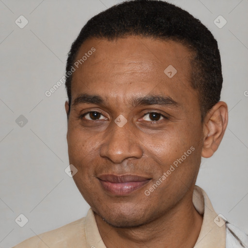 Joyful latino young-adult male with short  brown hair and brown eyes