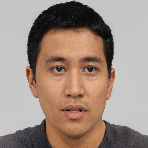 Neutral asian young-adult male with short  black hair and brown eyes