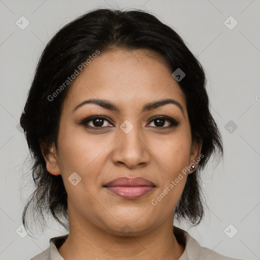 Joyful latino young-adult female with medium  brown hair and brown eyes