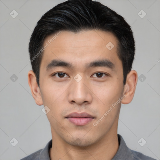 Neutral asian young-adult male with short  black hair and brown eyes