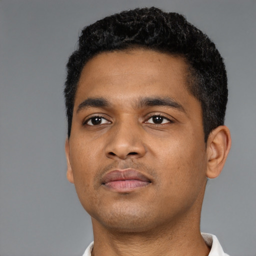 Neutral black young-adult male with short  black hair and brown eyes