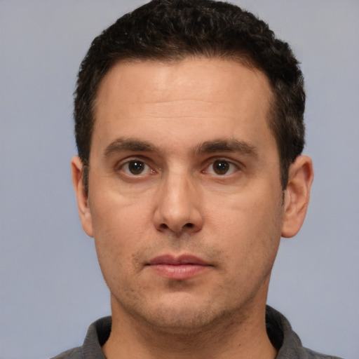 Neutral white adult male with short  brown hair and brown eyes