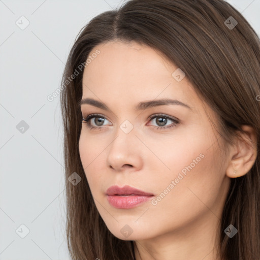 Neutral white young-adult female with long  brown hair and brown eyes