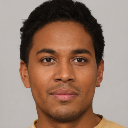 Neutral latino young-adult male with short  brown hair and brown eyes