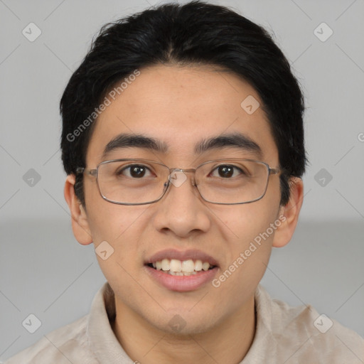 Joyful white young-adult male with short  black hair and brown eyes