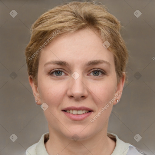 Joyful white young-adult female with short  brown hair and grey eyes