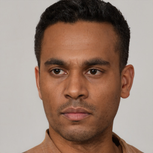 Neutral latino young-adult male with short  black hair and brown eyes