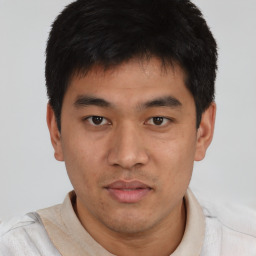 Neutral asian young-adult male with short  brown hair and brown eyes