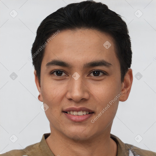 Joyful latino young-adult male with short  black hair and brown eyes