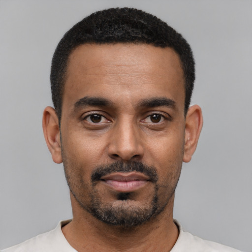 Neutral black young-adult male with short  black hair and brown eyes