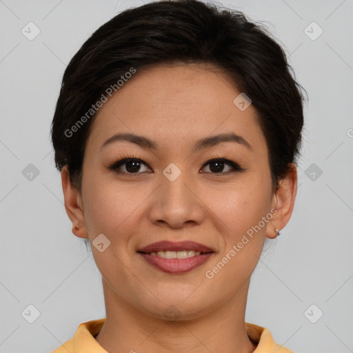 Joyful asian young-adult female with short  brown hair and brown eyes