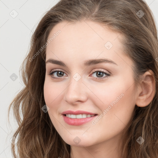 Joyful white young-adult female with long  brown hair and blue eyes