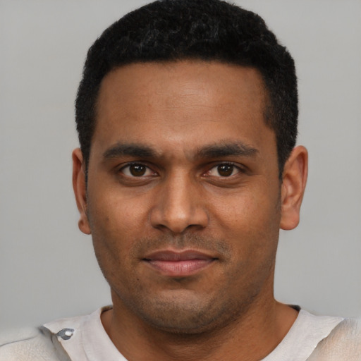 Neutral black young-adult male with short  brown hair and brown eyes