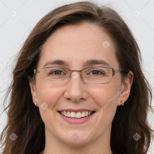 Joyful white adult female with long  brown hair and brown eyes