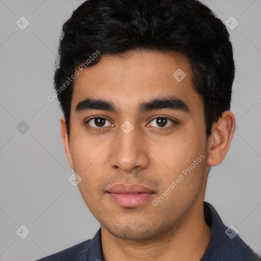 Neutral latino young-adult male with short  black hair and brown eyes