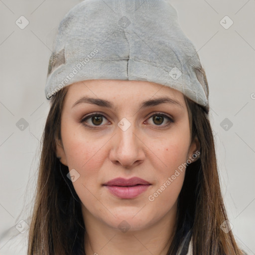 Joyful white young-adult female with long  brown hair and grey eyes