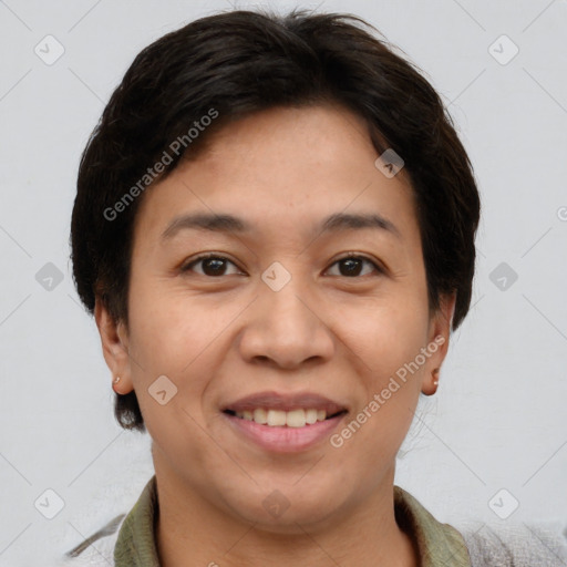 Joyful white adult female with short  brown hair and brown eyes