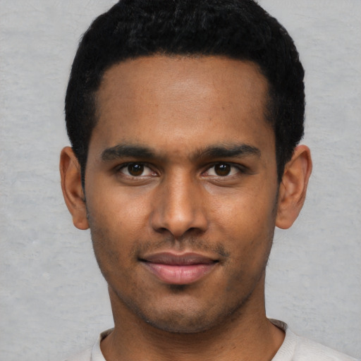 Neutral black young-adult male with short  black hair and brown eyes