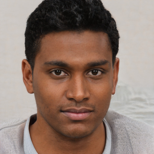 Neutral black young-adult male with short  brown hair and brown eyes