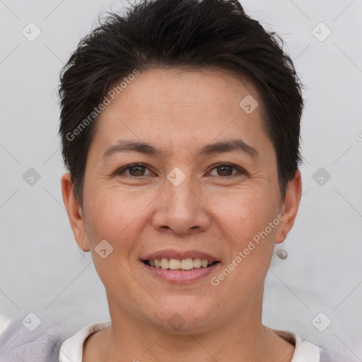 Joyful white adult female with short  brown hair and brown eyes