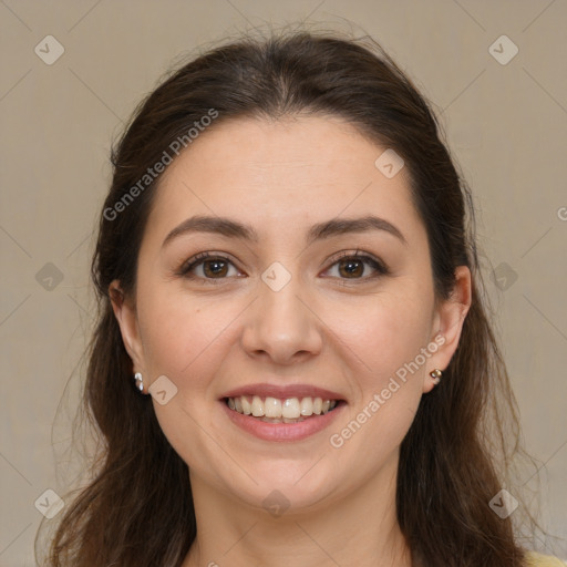 Joyful white young-adult female with long  brown hair and brown eyes