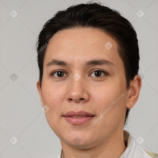 Joyful white adult female with short  brown hair and brown eyes