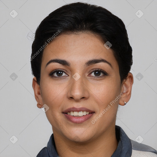 Joyful latino young-adult female with short  black hair and brown eyes