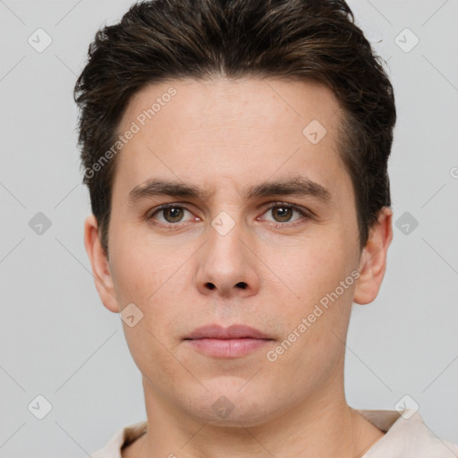 Neutral white young-adult male with short  brown hair and brown eyes