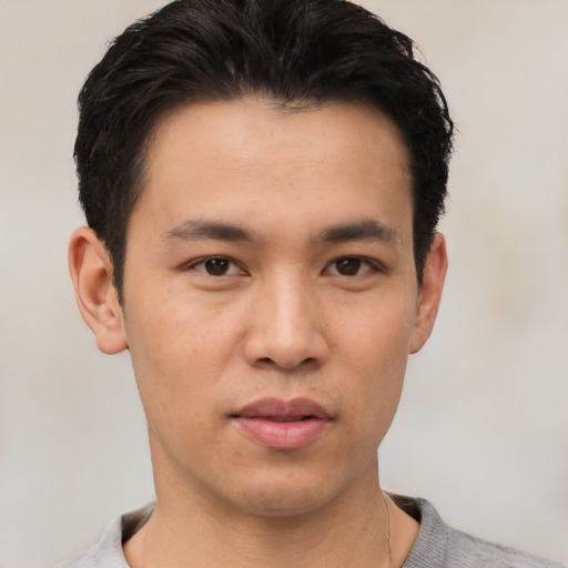 Neutral asian young-adult male with short  black hair and brown eyes