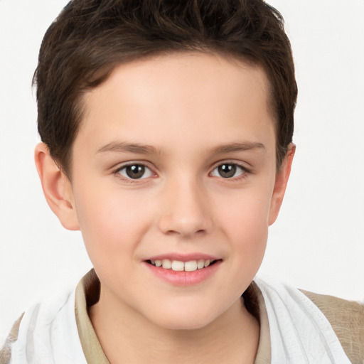 Joyful white child female with short  brown hair and brown eyes